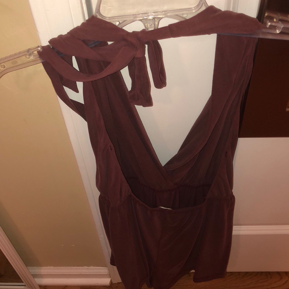 Super cute boutique romper with an open back! - Picture 2 of 4